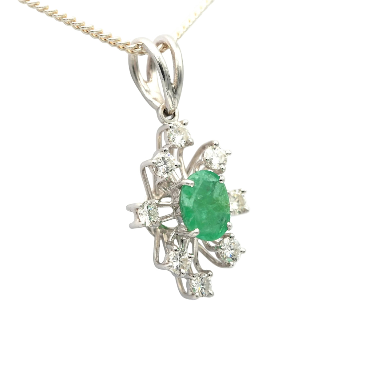 Pendentif en or blanc, émeraude et diamants
