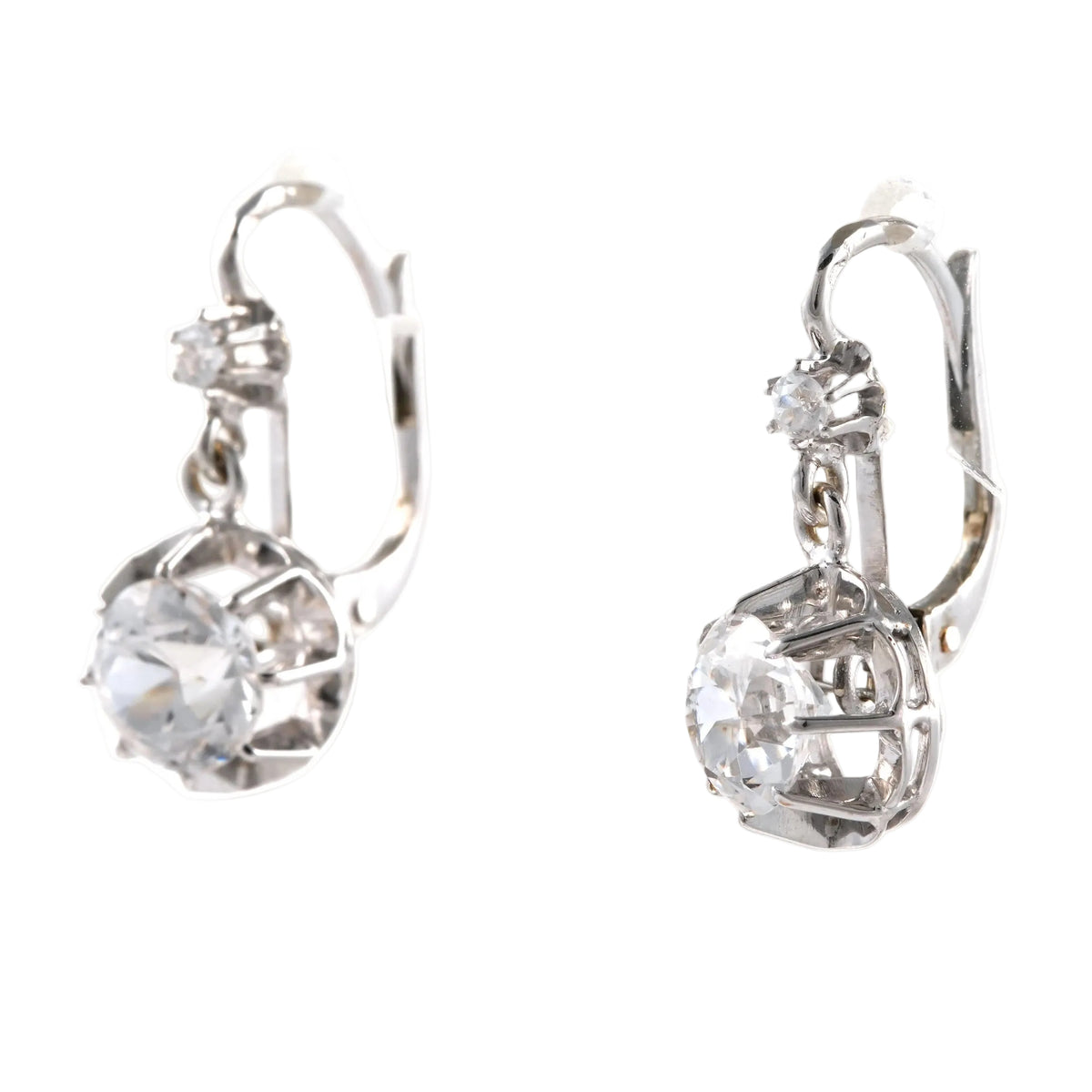 Boucles d'oreilles Dormeuses en or blanc et zirconiums