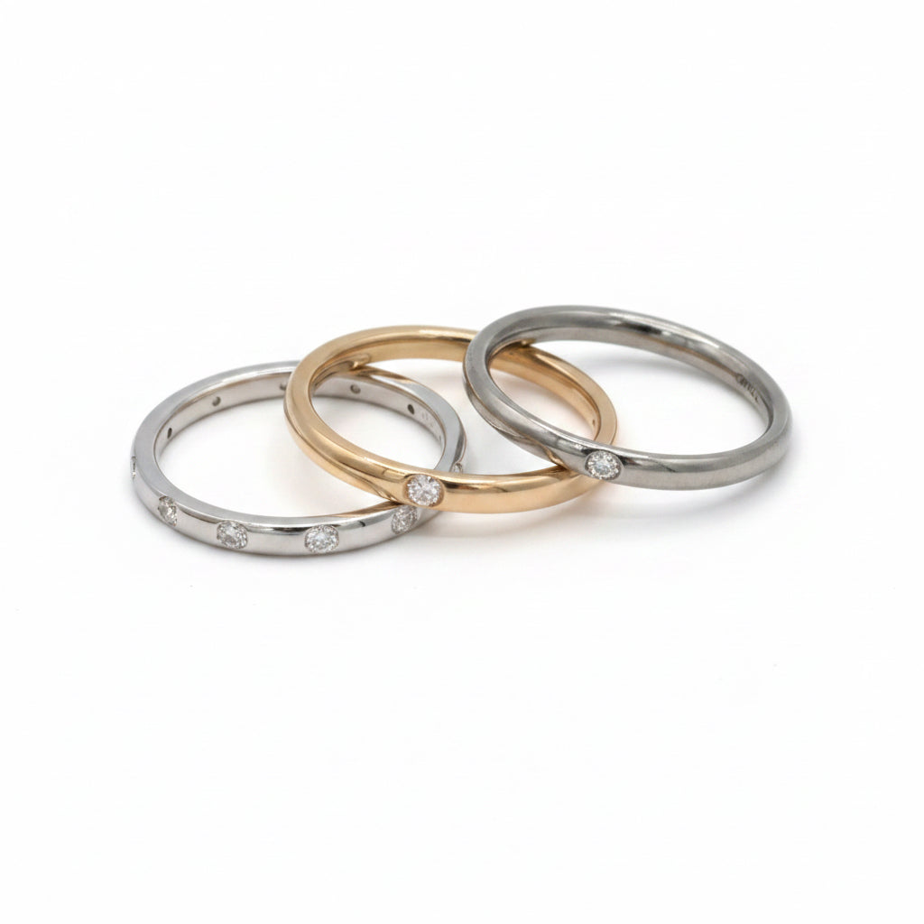 Trois Bagues Lucciole en Or blanc, Titane et Diamants