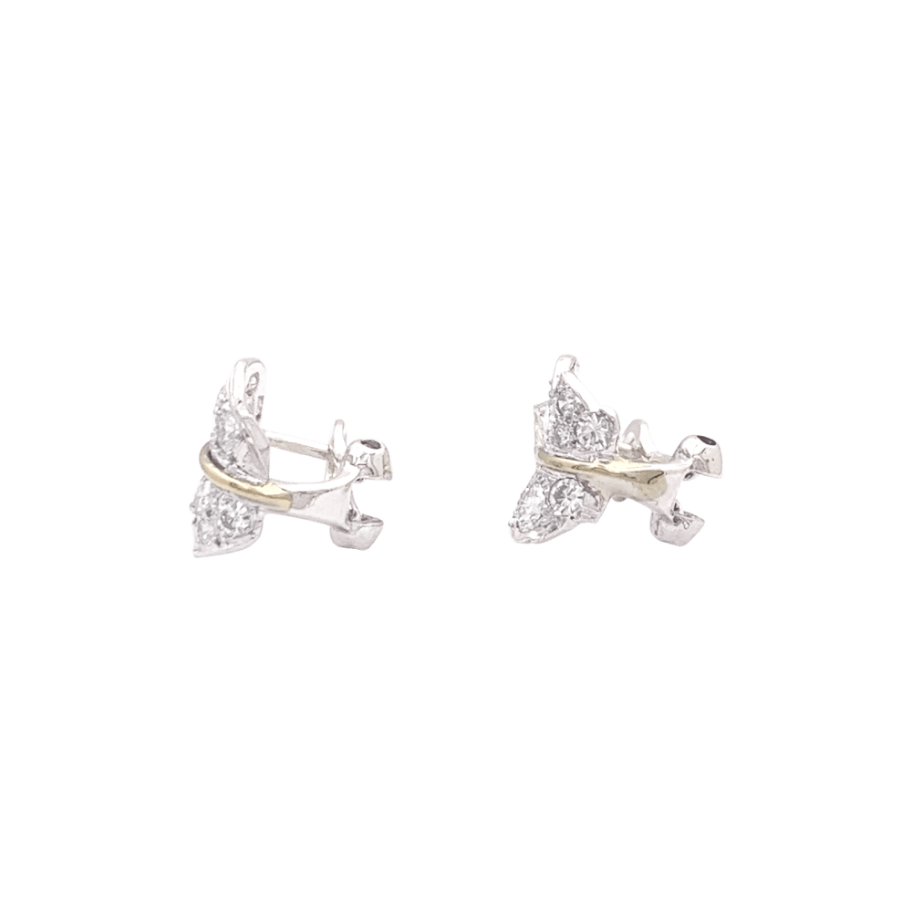 Boucles d'oreilles feuilles deux tons d'or et diamants.