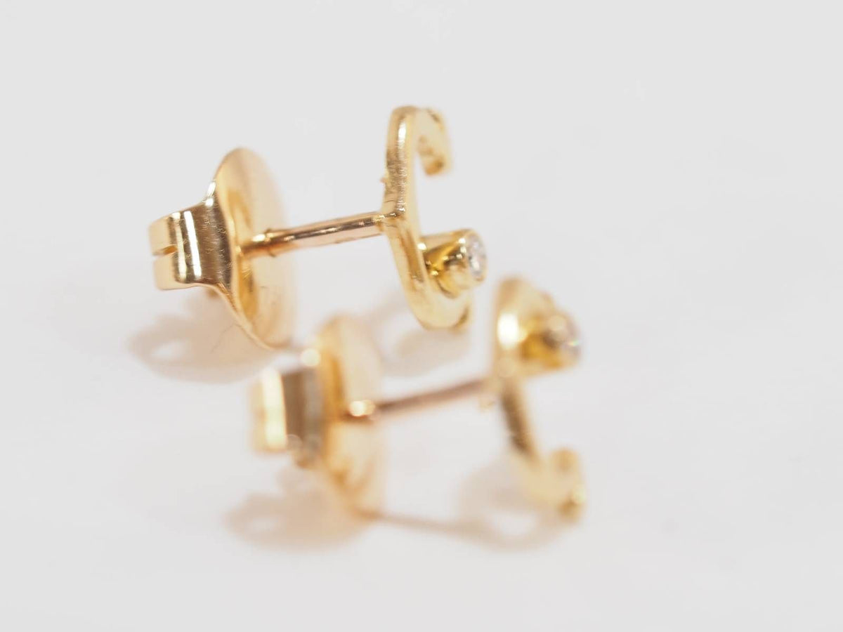 Boucles d'oreilles Puces CARTIER "C" en or jaune et diamants