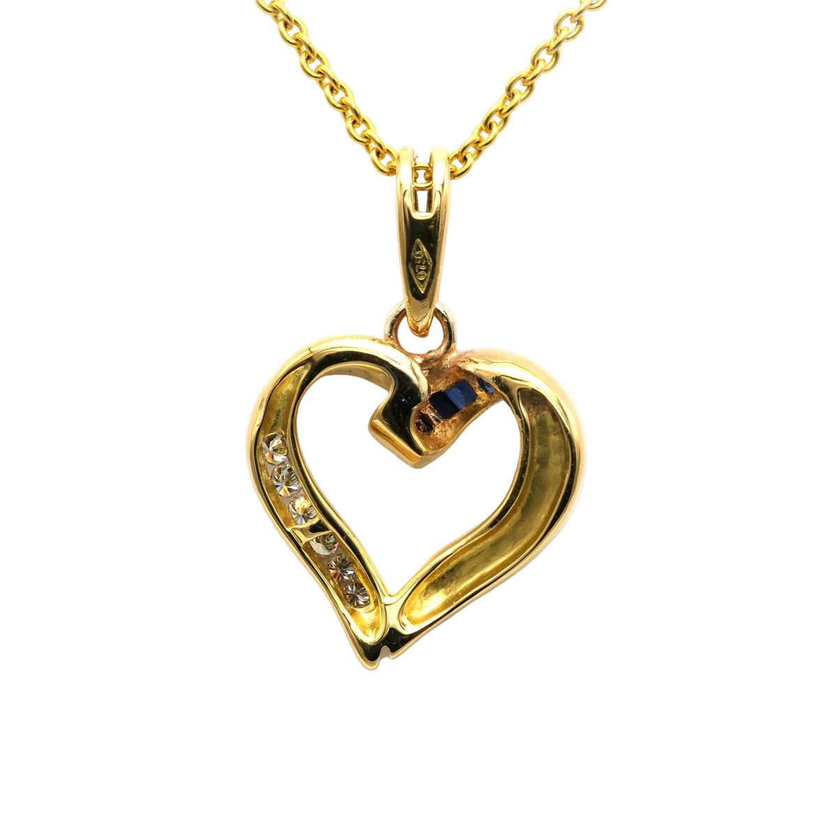 Pendentif en or jaune, saphirs et diamants