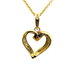 Pendentif en or jaune, saphirs et diamants