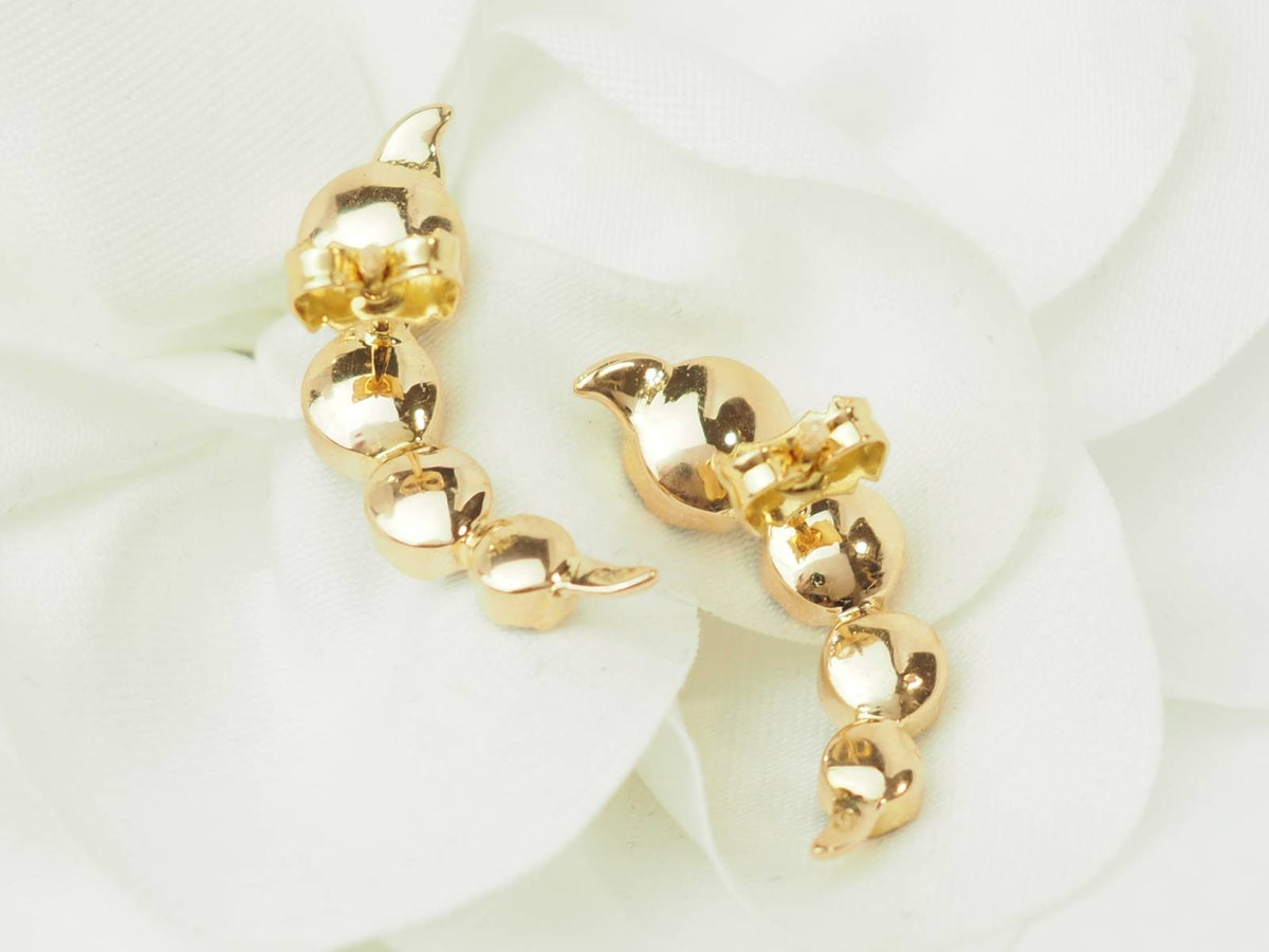 Boucles d’oreilles en or jaune et grenats