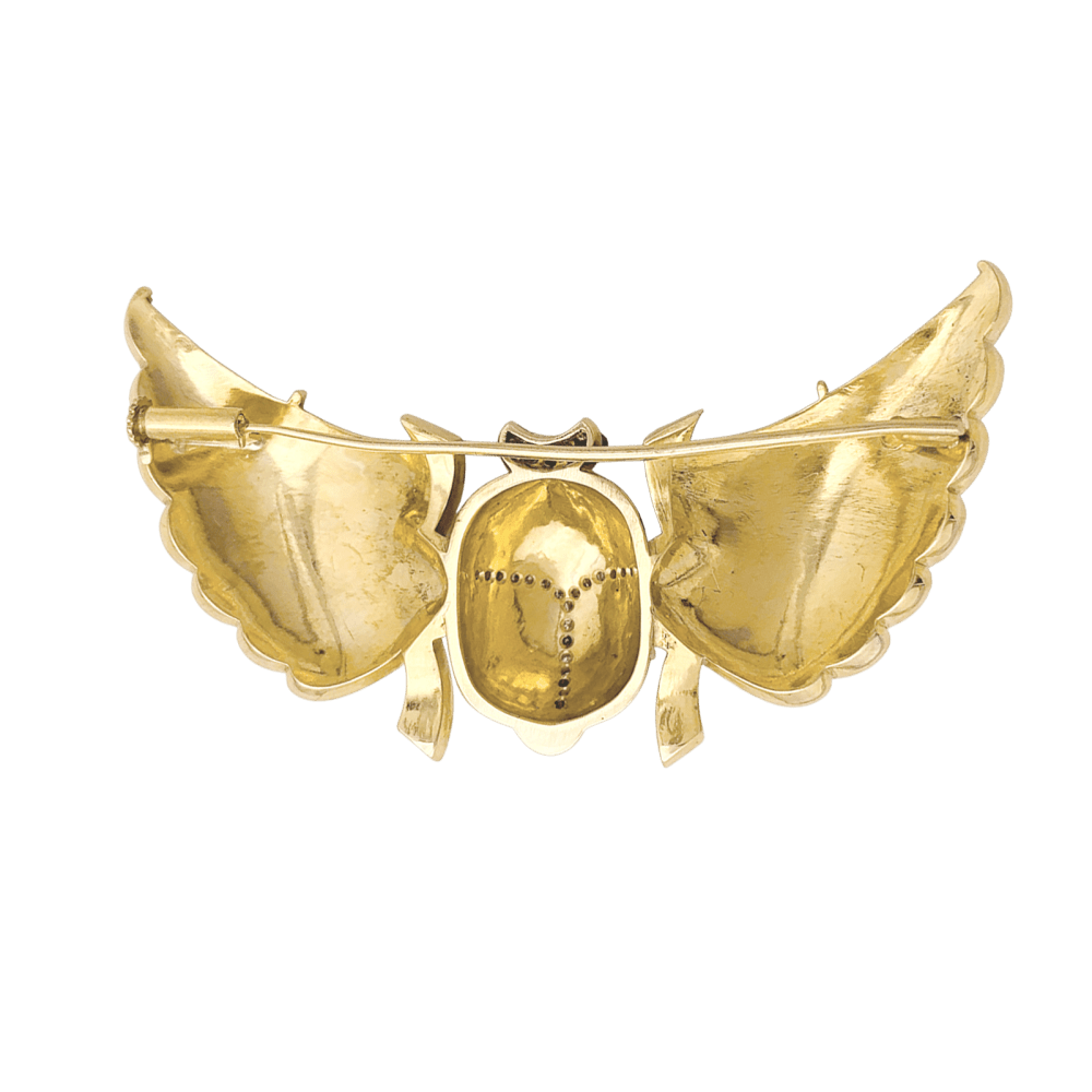 Broche "Scarabée" en or jaune, diamants et rubis.