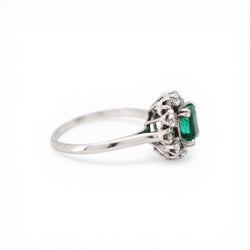 Bague Marguerite MELLERIO en platine, émeraude et diamants