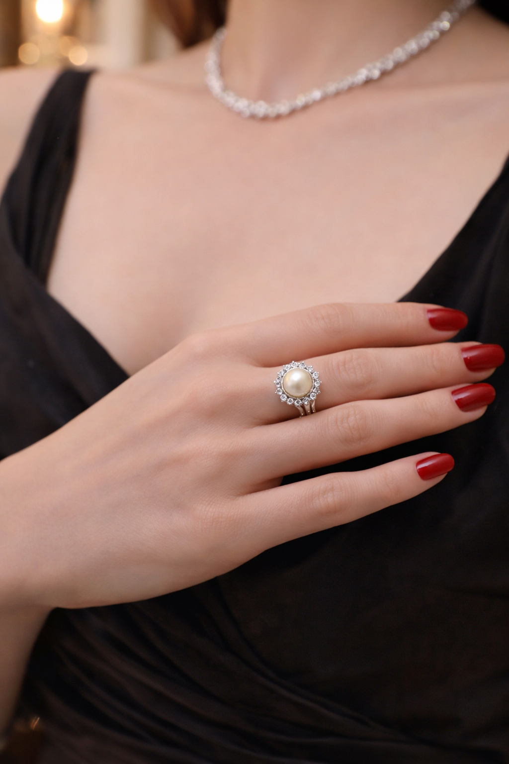 Bague Entourage en on blanc, perle et diamants