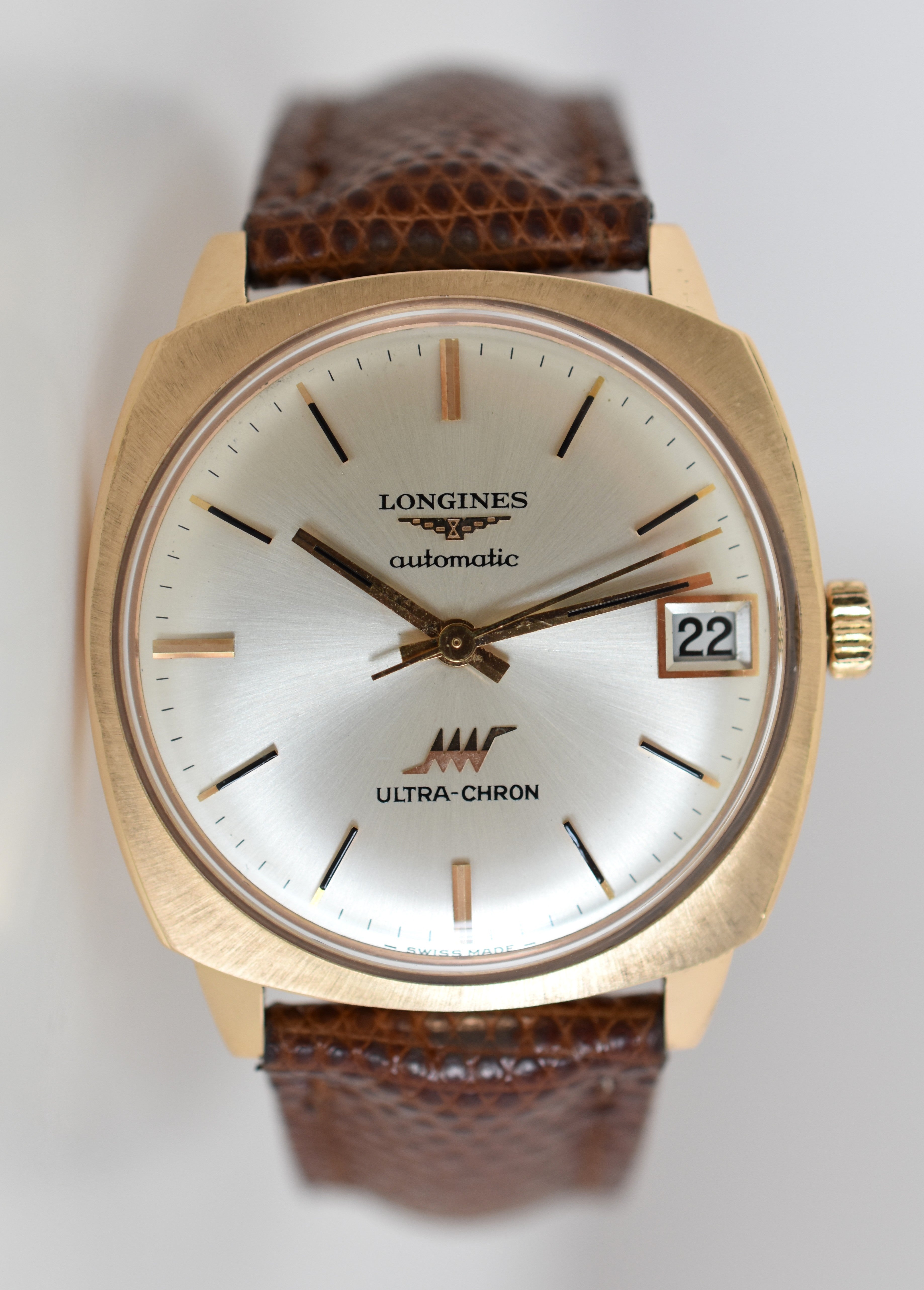 Montre LONGINES "Ultra Chron" en or jaune, argent et cuir