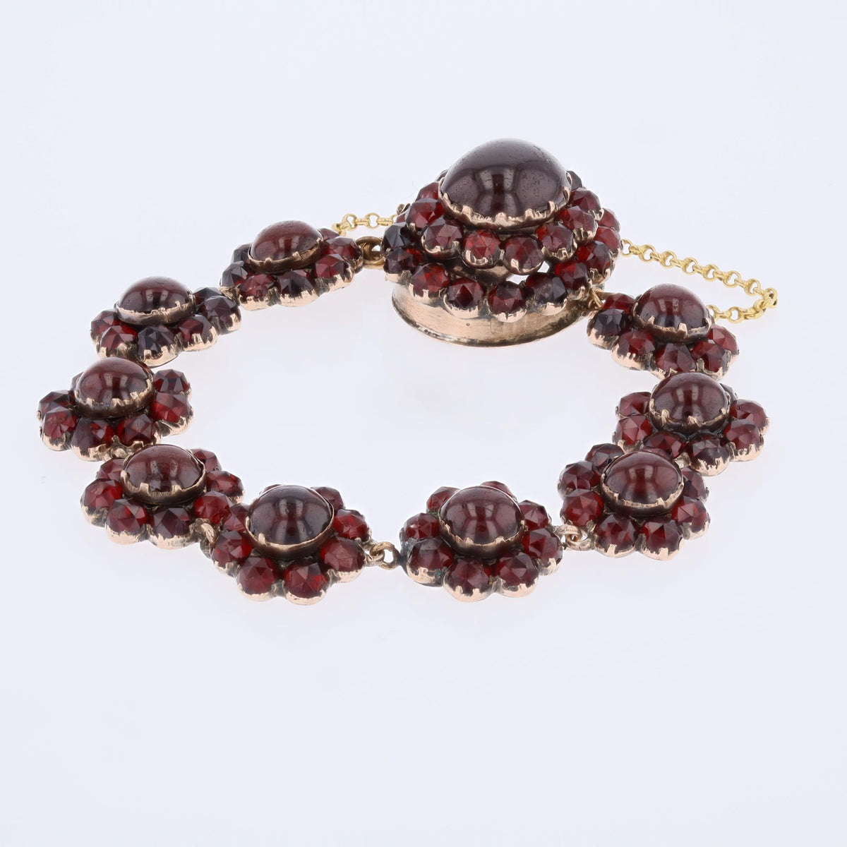 Bracelet en or jaune, argent et grenats