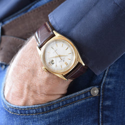 Montre ROLEX "Oyster Perpetual Date Ovettone" en or jaune et cuir