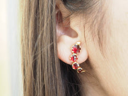 Boucles d’oreilles en or jaune et grenats