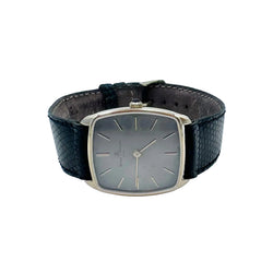 Montre BAUME & MERCIER en or jaune et cuir