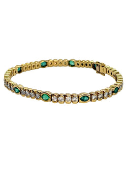 Bracelet Ligne en or jaune, émeraudes et diamants