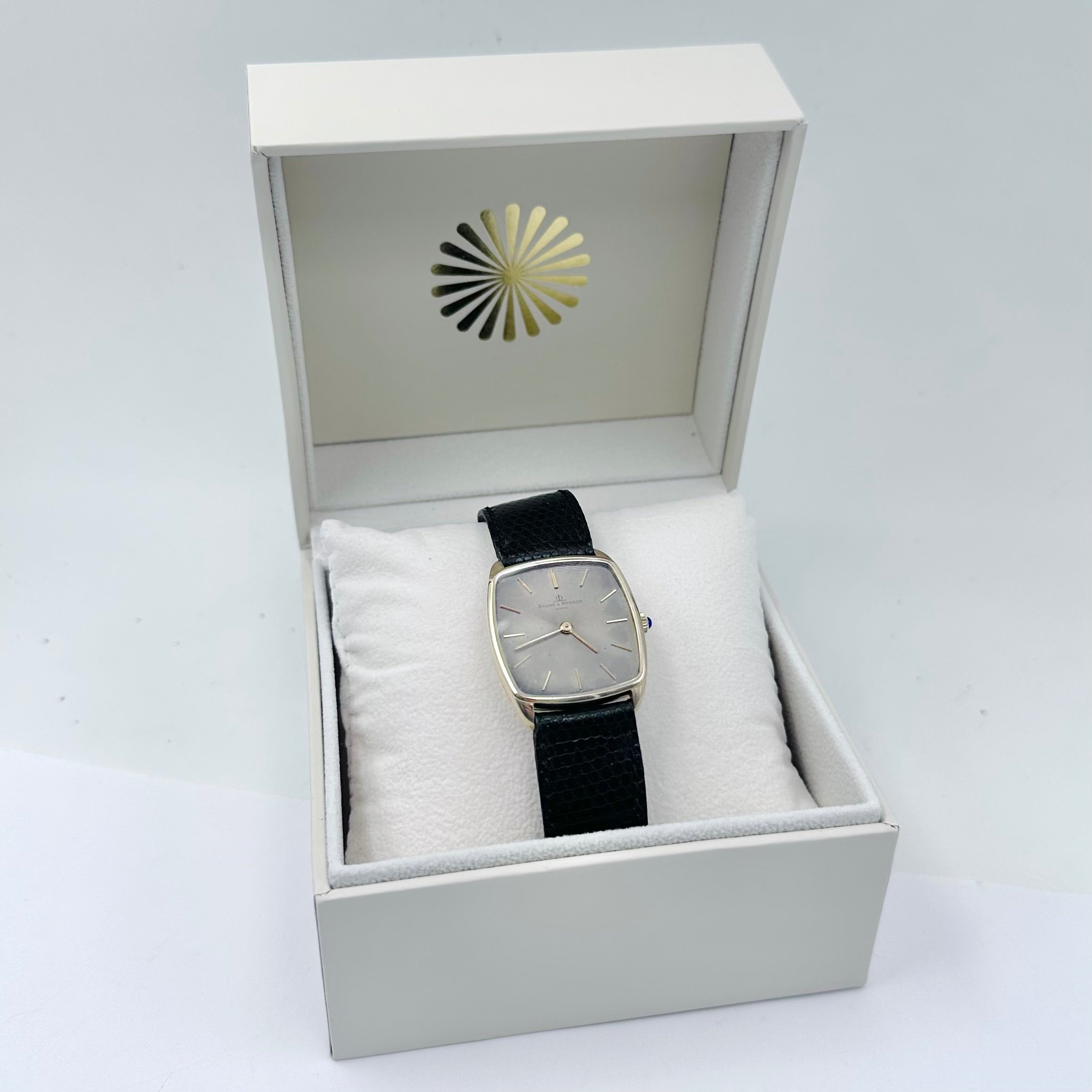Montre BAUME & MERCIER en or jaune et cuir