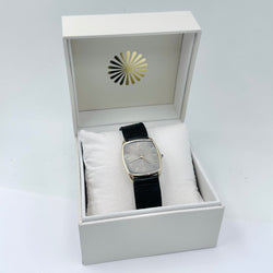 Montre BAUME & MERCIER en or jaune et cuir