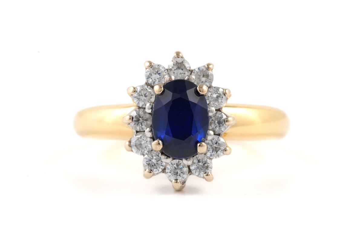 Bague Marguerite en or jaune, saphir et zirconiums