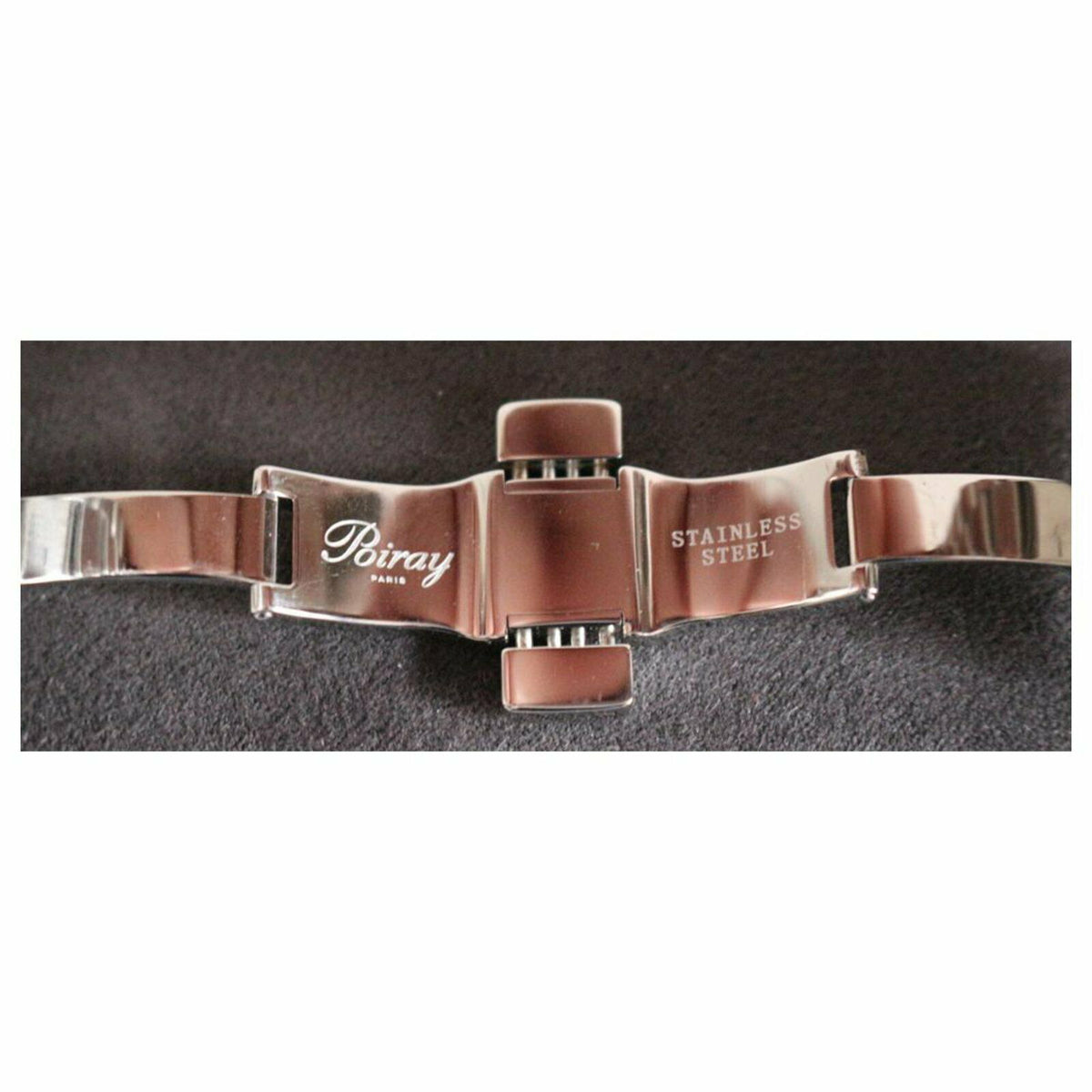 Montre POIRAY "Ma Première Manchette" en acier, nacre, quartz et diamants