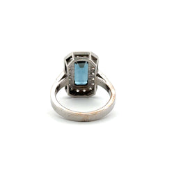 Bague Entourage en or blanc, topaze et diamants