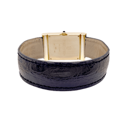 Montre Boucheron, "Reflet", or jaune, cuir.