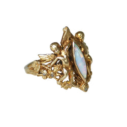 Bague en or jaune, opale et diamants