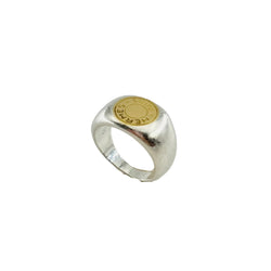 Bague Chevalière HERMÈS "Clou de selle" en argent et or jaune