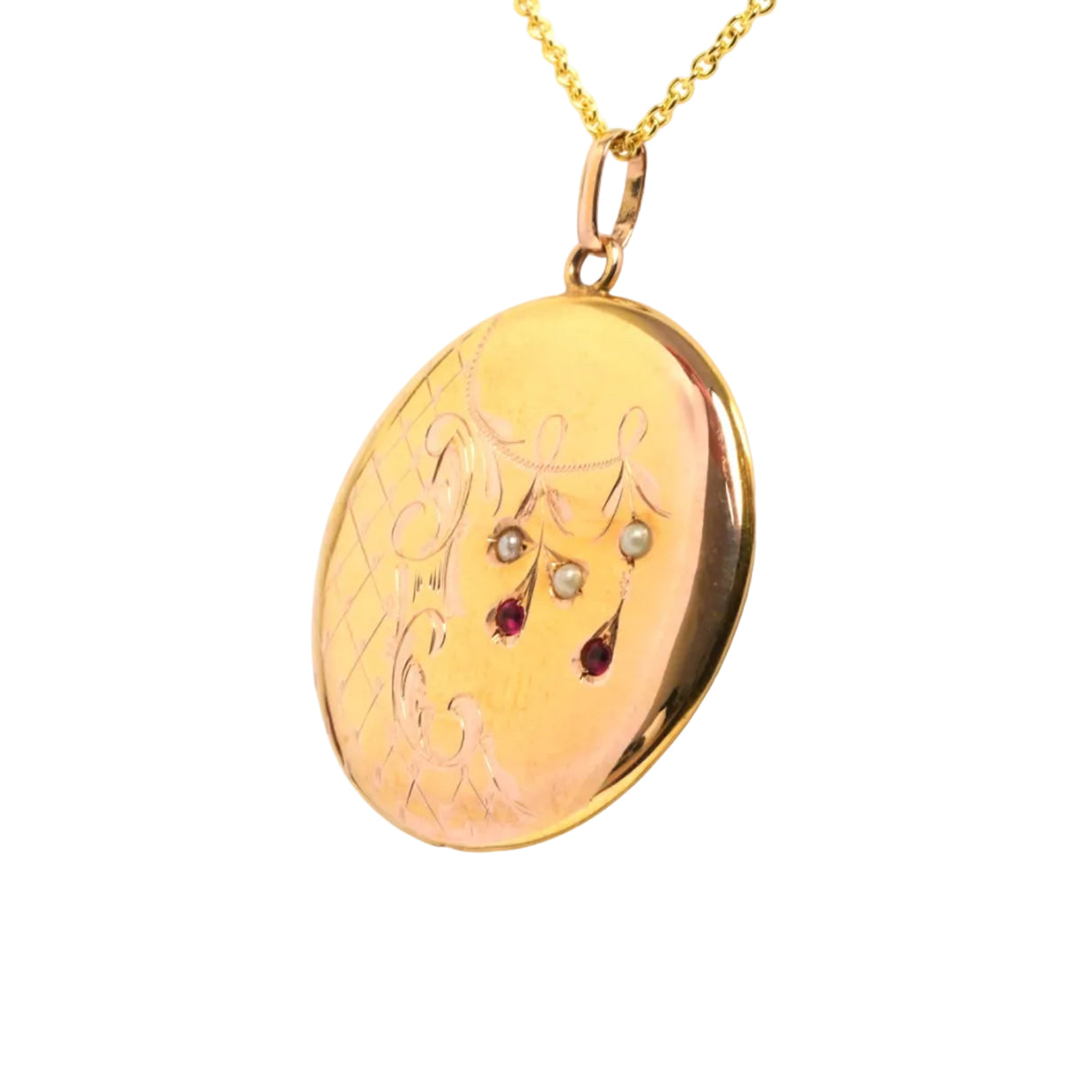 Pendentif en or jaune, perles et rubis