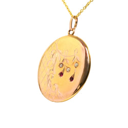 Pendentif en or jaune, perles et rubis