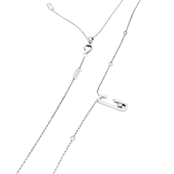 Collier Messika, "Move", or blanc et diamants.