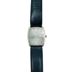 Montre BAUME & MERCIER en or jaune et cuir