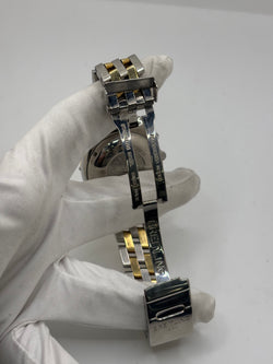 Montre Breitling Chronomat en or et acier