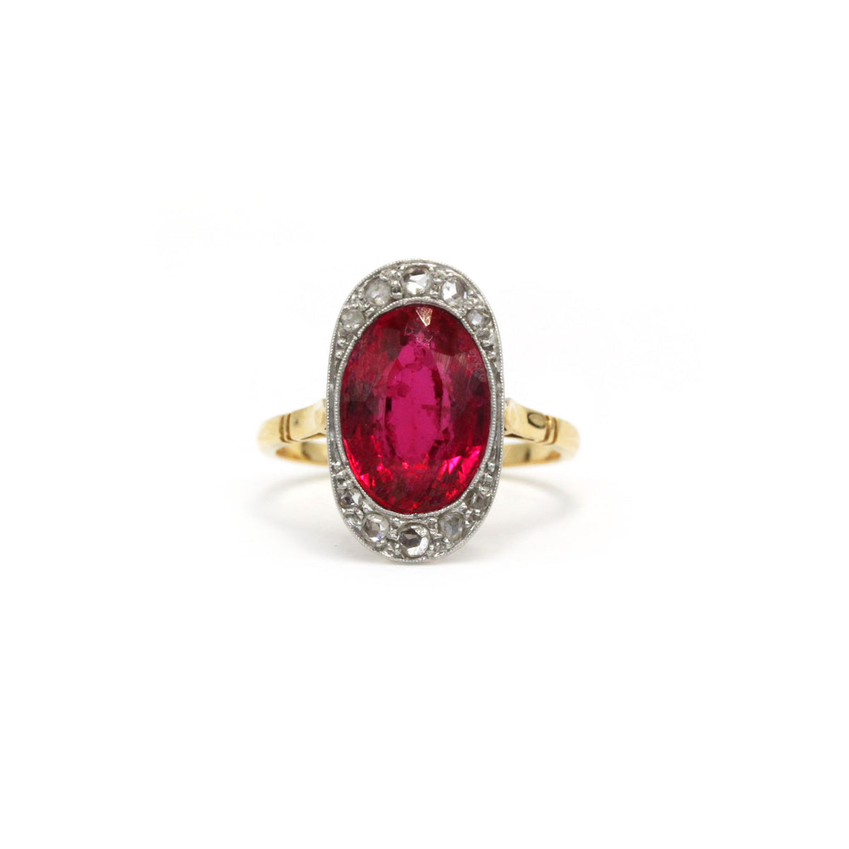 Bague Entourage en or jaune, or blanc, rubis et diamants