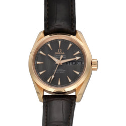 Montre OMEGA en or rose et cuir