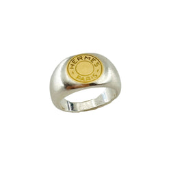 Bague Chevalière HERMÈS "Clou de selle" en argent et or jaune