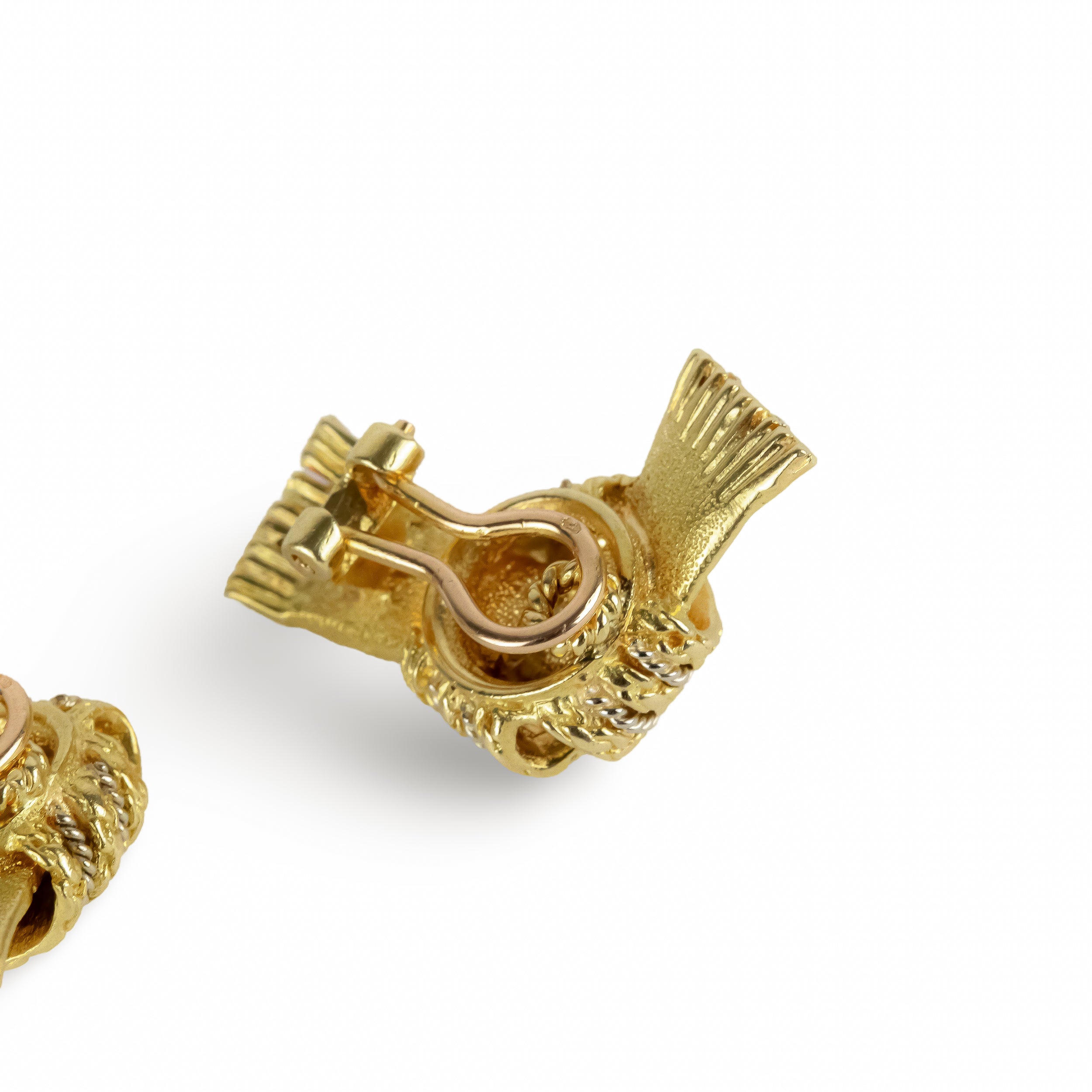 Boucles d'oreilles Clip HERMÈS Nœud en or jaune et or blanc