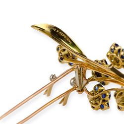 VAN CLEEF & ARPELS “Bouquet de fleurs” clip brooch in yellow gold and sapphires
