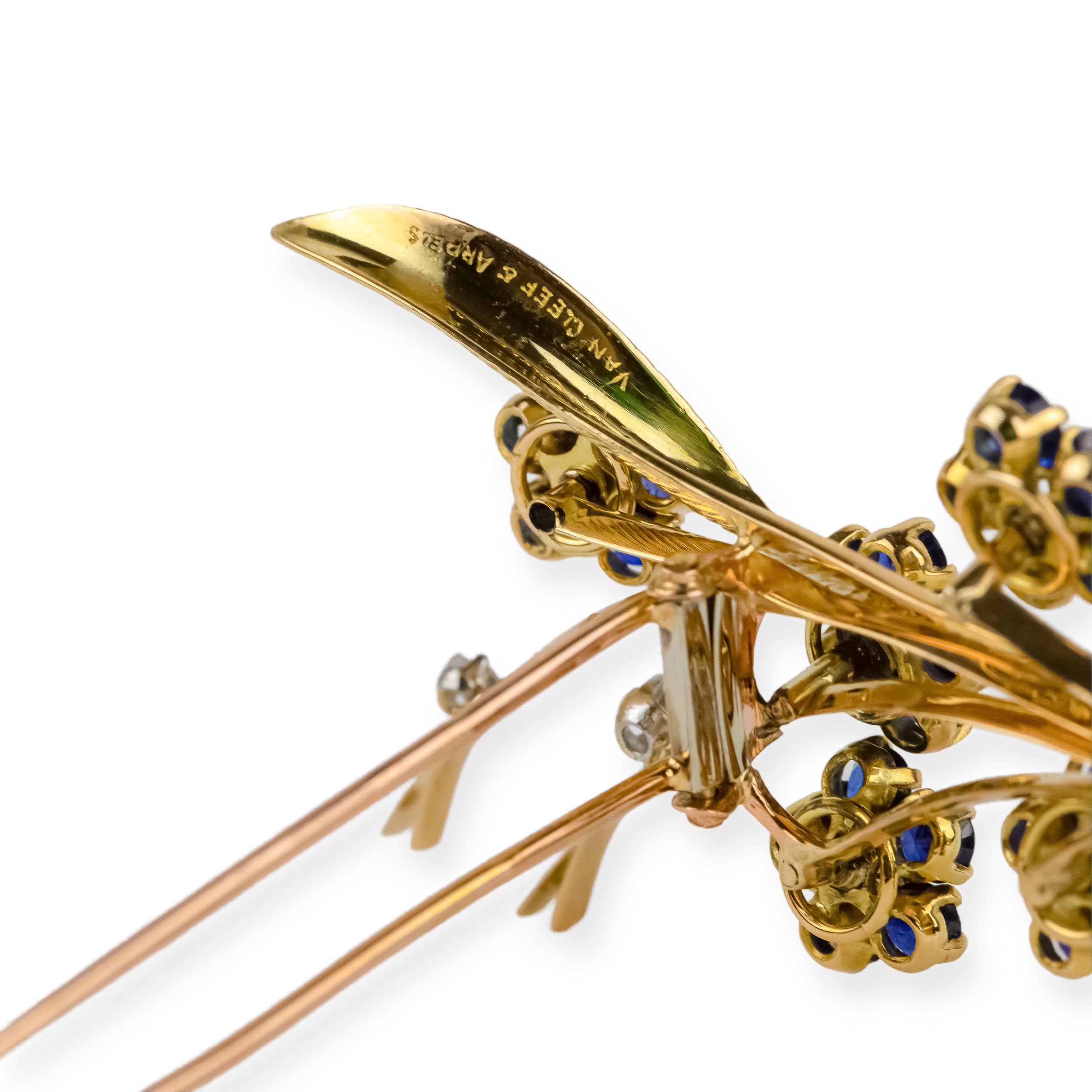 VAN CLEEF & ARPELS “Bouquet de fleurs” clip brooch in yellow gold and sapphires