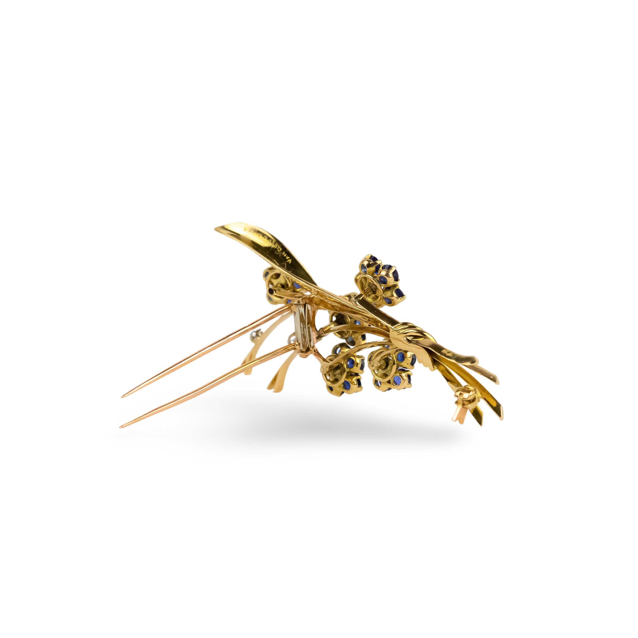 VAN CLEEF & ARPELS “Bouquet de fleurs” clip brooch in yellow gold and sapphires