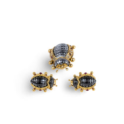 Eva SEGOURA set in yellow gold, hematite and diamonds