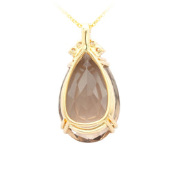 Pendentif en or jaune, quartz et diamants