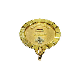 Médaille AUGIS en or jaune, or rose, rubis et diamant
