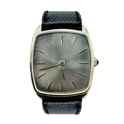 Montre BAUME & MERCIER en or jaune et cuir