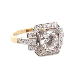 Bague Entourage en or jaune, platine et diamants