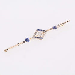 Broche Barrette en or jaune, platine, saphirs et diamants