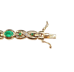Bracelet Ligne en or jaune, émeraudes et diamants