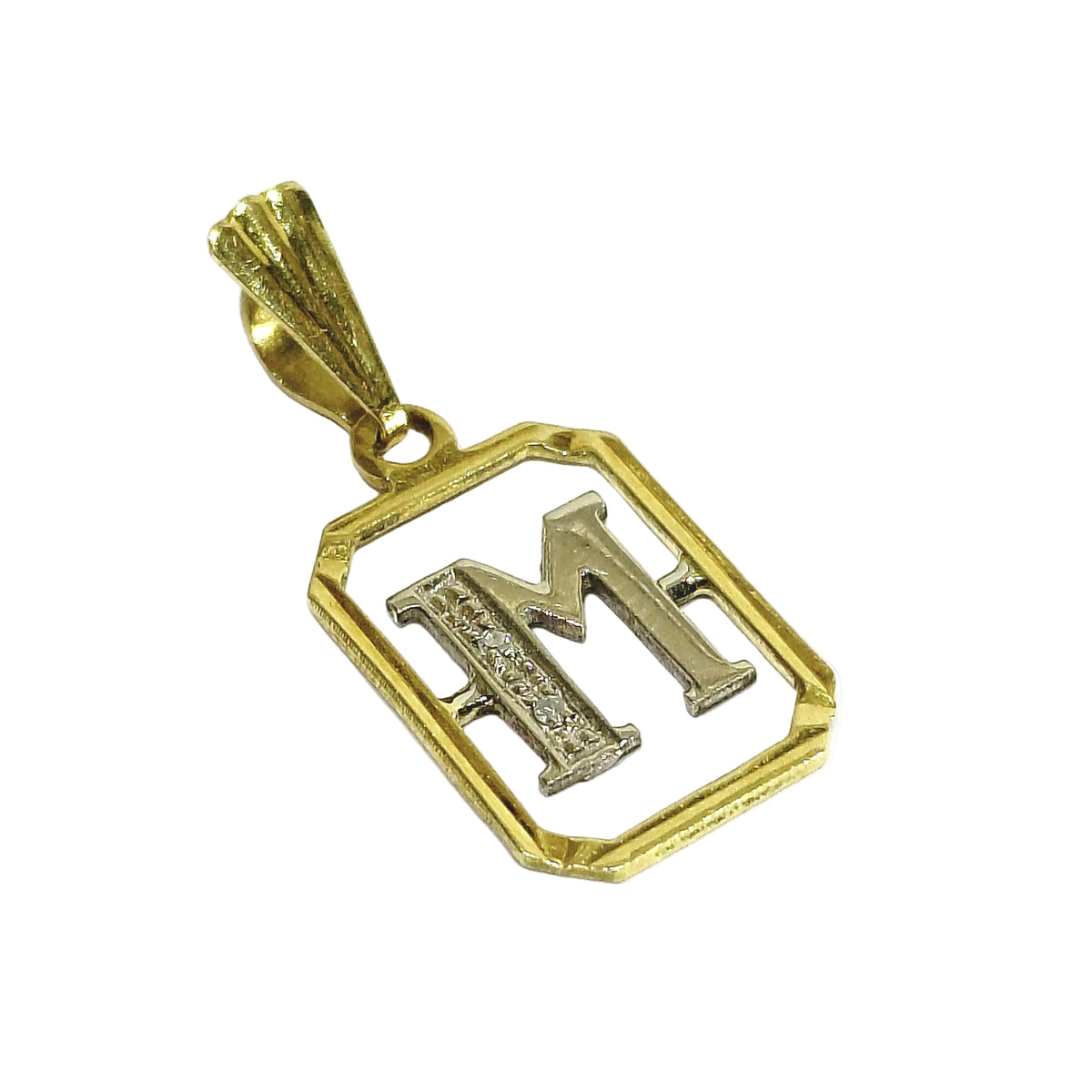 Pendentif “M” en or blanc, or jaune et diamants