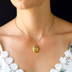 Médaillon en or jaune et perle