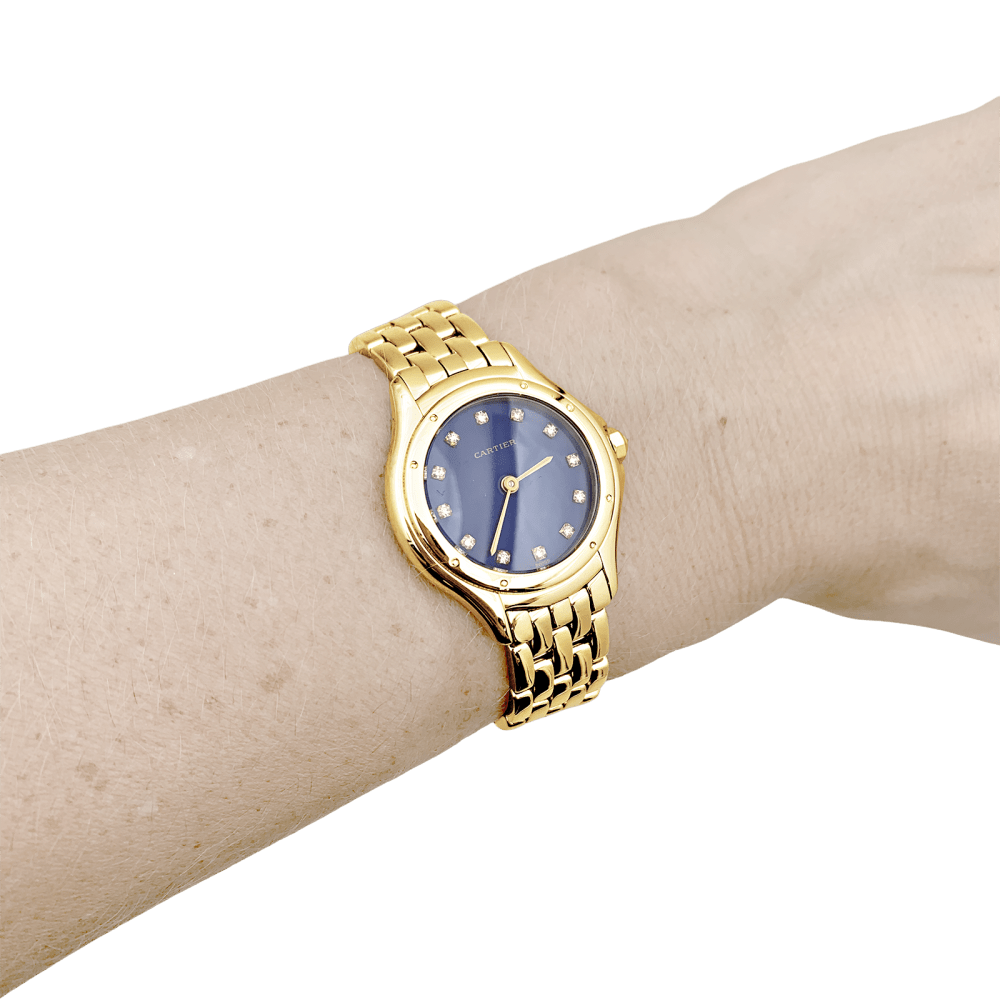 Montre Femme CARTIER, "Cougar", or jaune, index diamants.