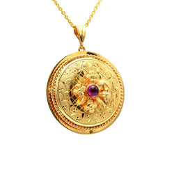 Pendentif en or jaune et rubis