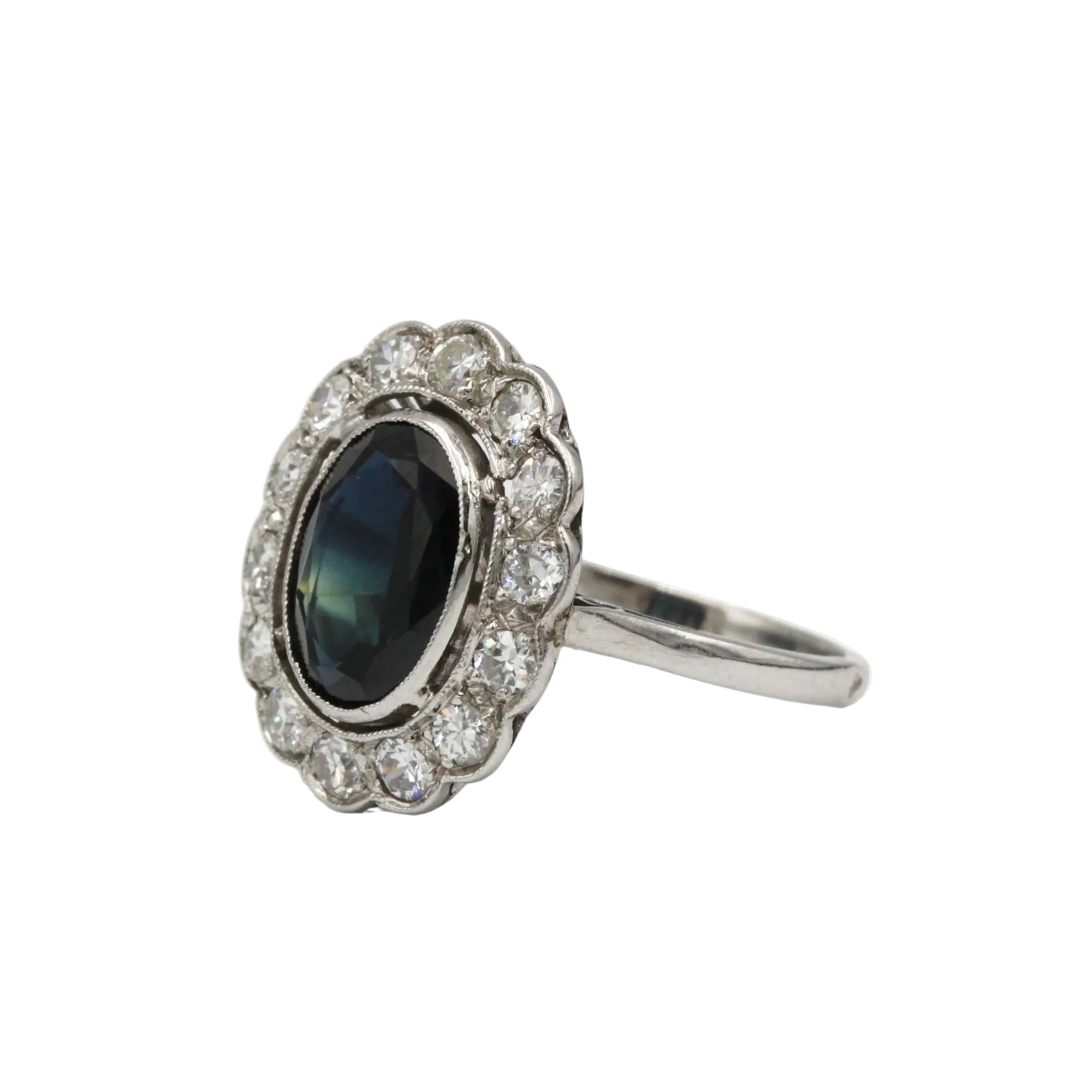 Bague Marguerite en or blanc, saphir et diamants