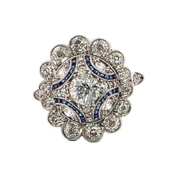 Bague Entourage en platine, saphirs et diamants